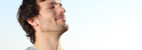 Man doing deep breathing exercises for stress relief